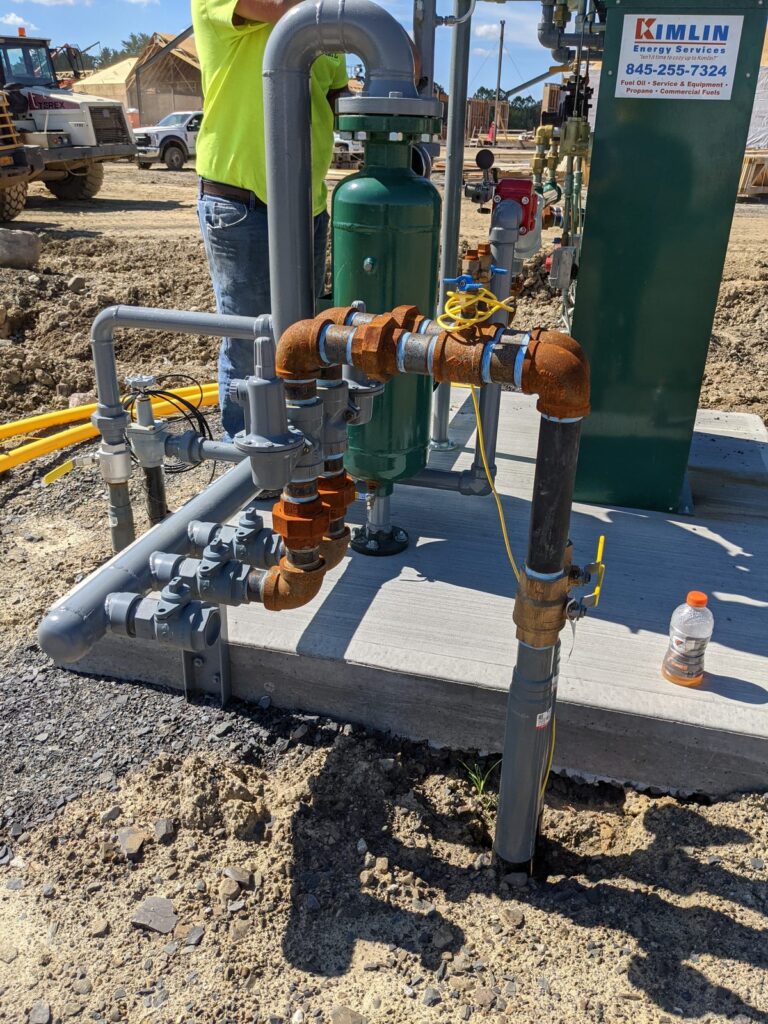 Kimlin Energy propane vaporizer and regulator train installed on a concrete pad at a Hudson Valley construction site
